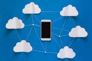 cloud computing - phone with cloud diagram surrounding it